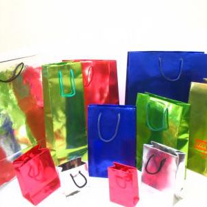 Fabricante Bolsas Impresion Terminacion con Laca UV Laminados Troquelados Pegado