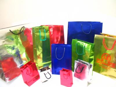 Fabricante Bolsas Impresion Terminacion con Laca UV Laminados Troquelados Pegado