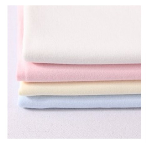 Interlock en blanco y colores. por mayor y por menor